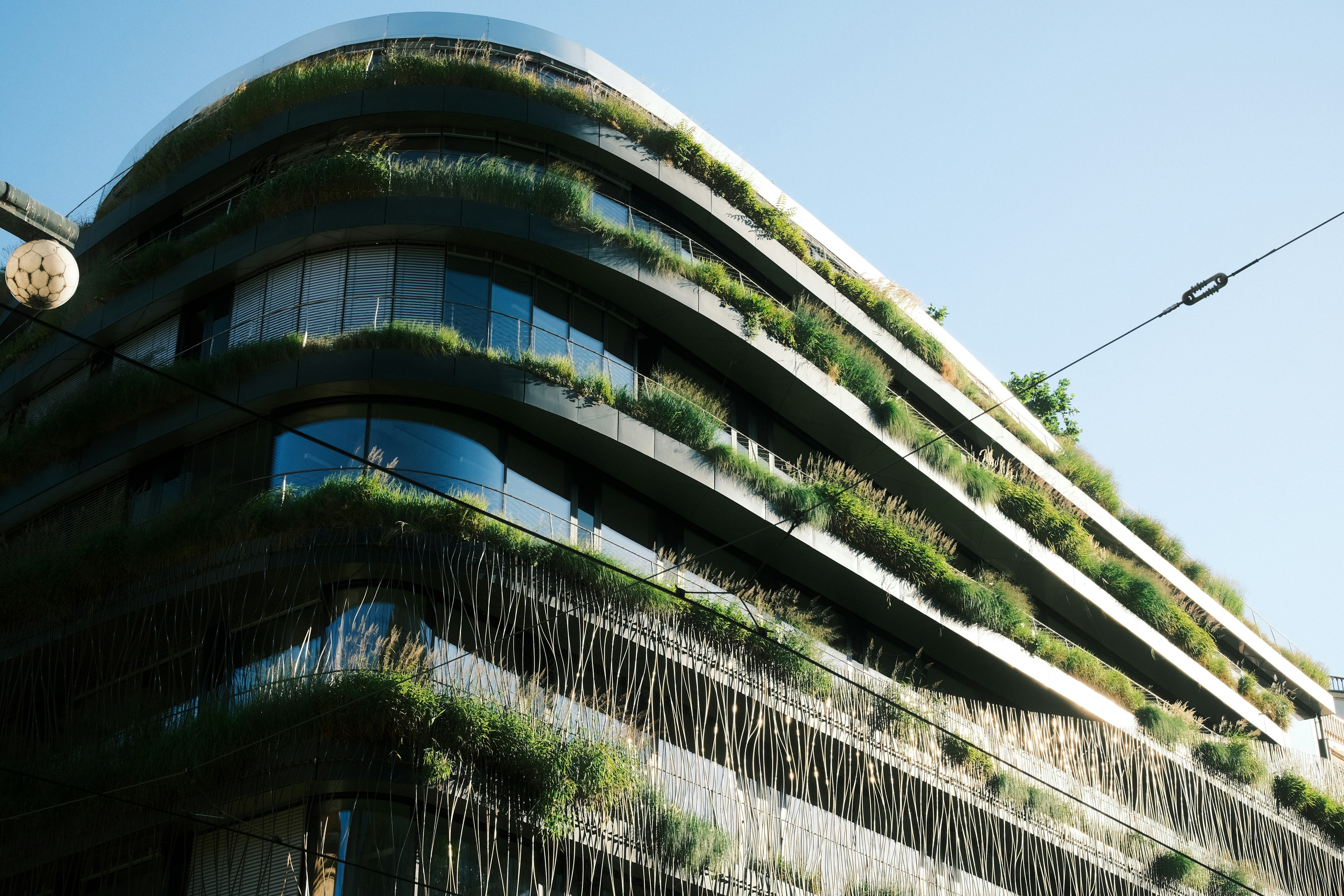 Modern building with lush green vertical gardens