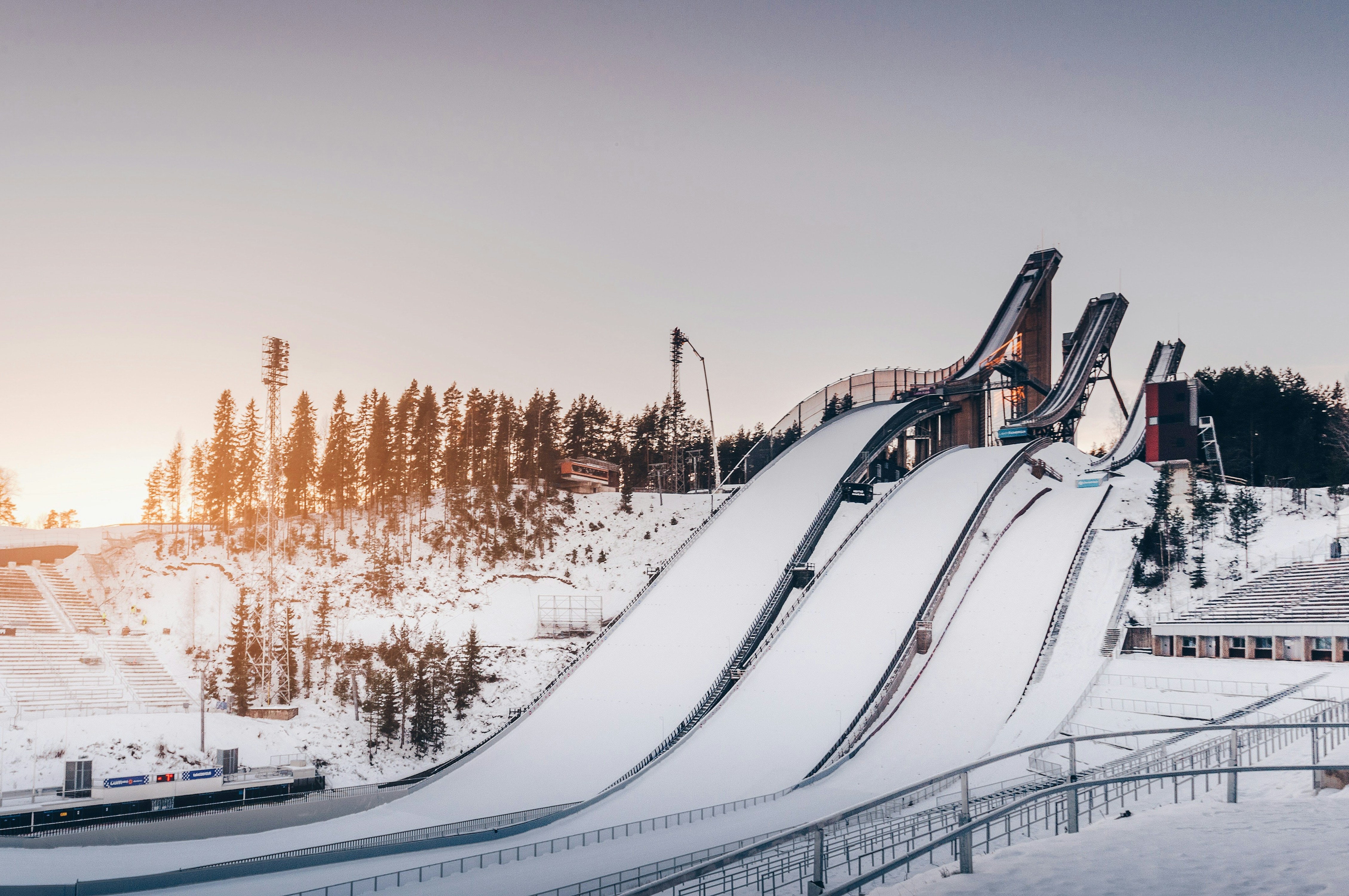 snow covered bridge during daytime