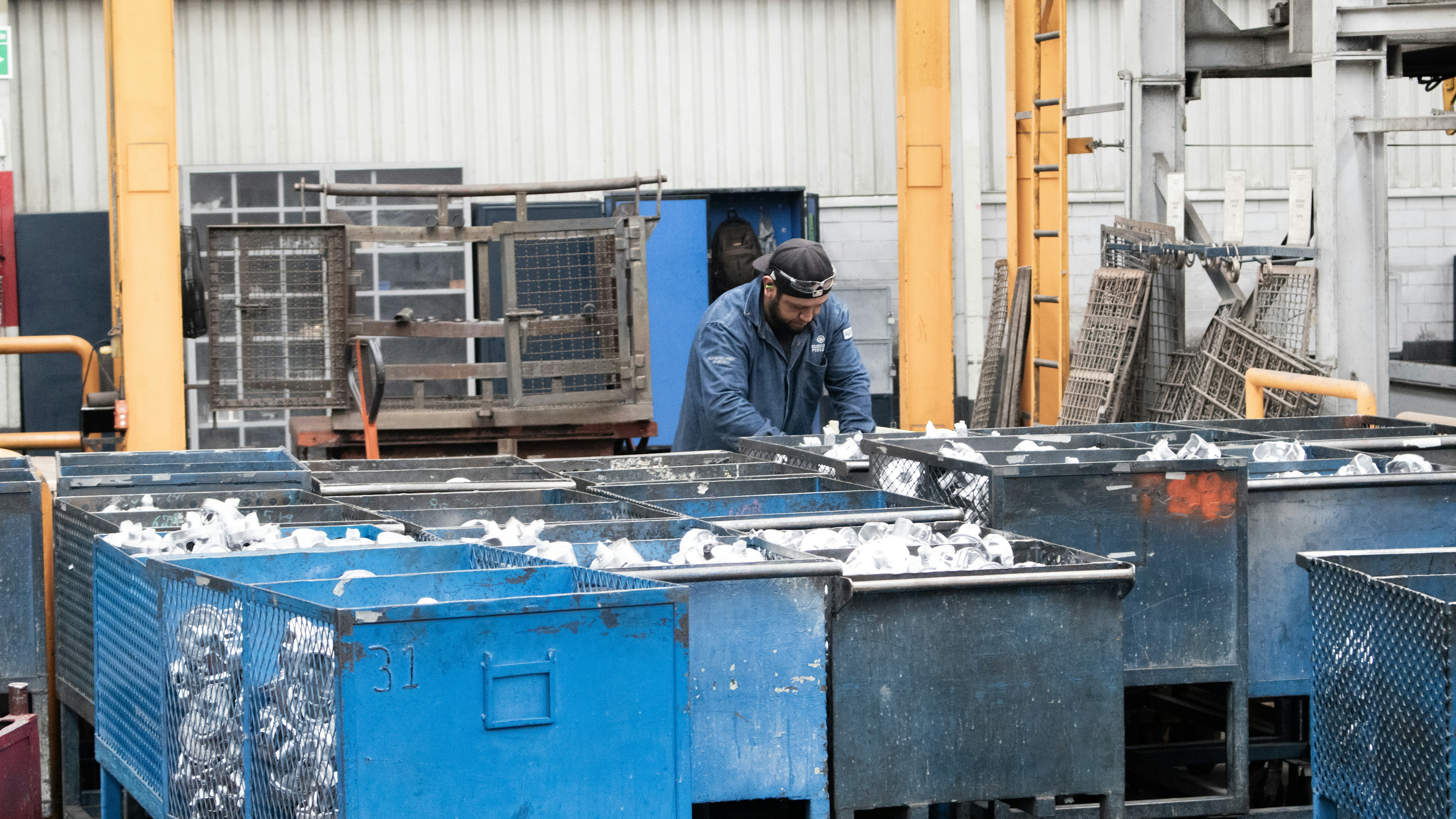 A man working on a machine in a factory