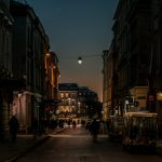 gray concrete road between buildings