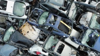 Pile of wrecked and crushed cars