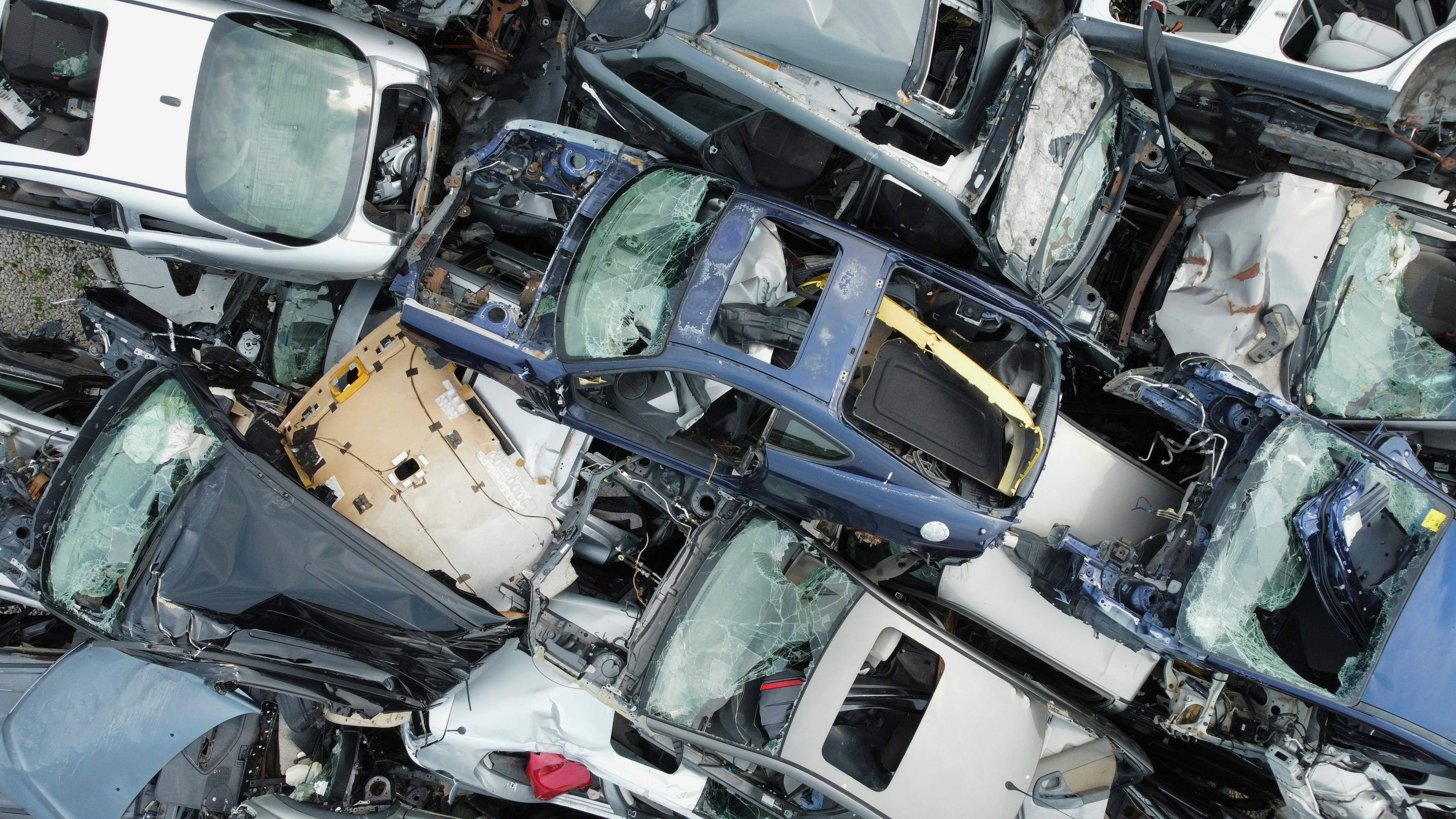 Pile of wrecked and crushed cars