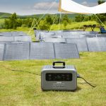 a portable generator in a field of solar panels