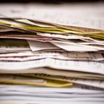 A close-up of a stack of papers.