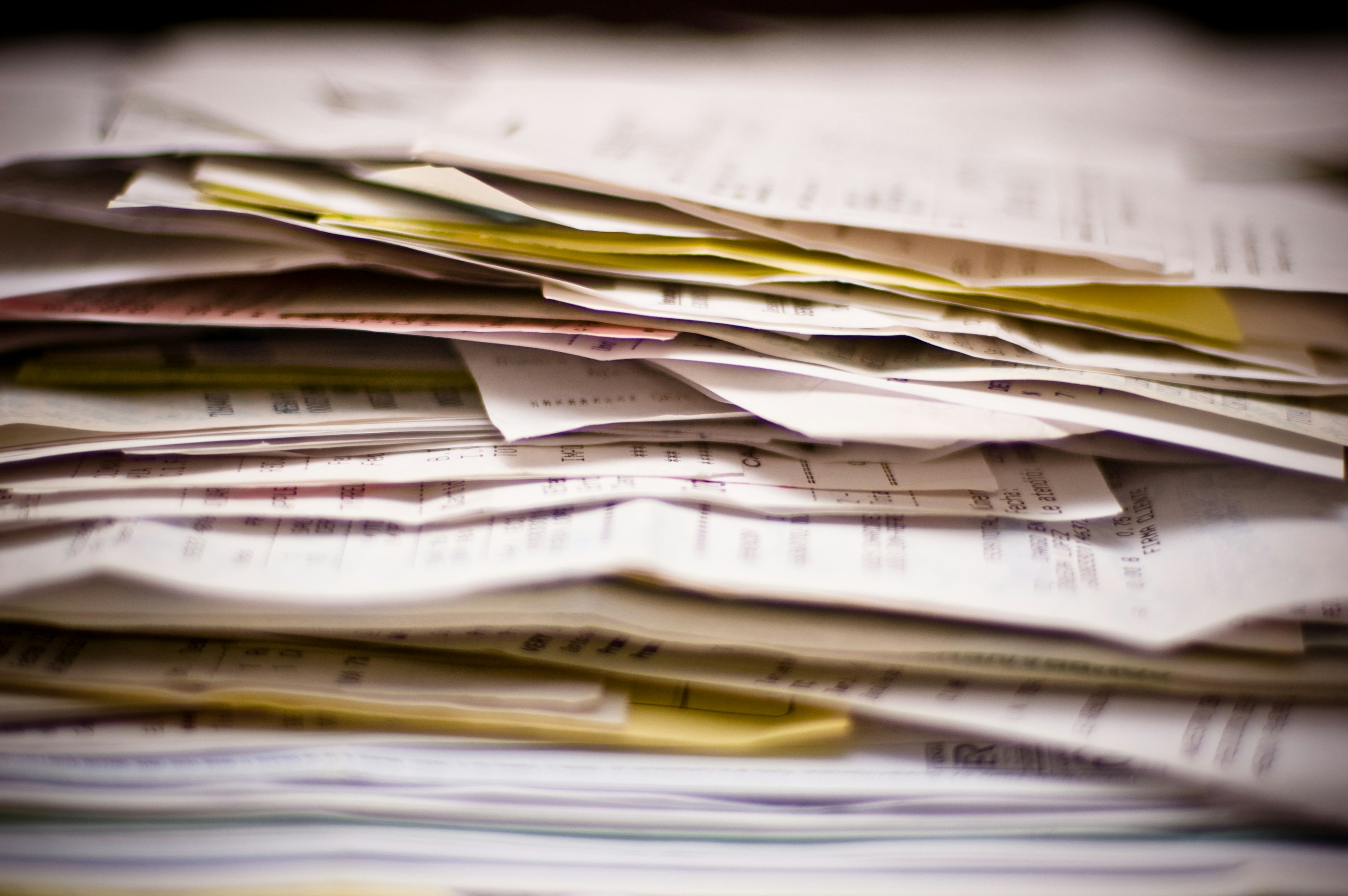 A close-up of a stack of papers.