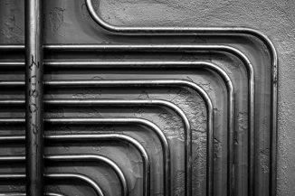 A black and white photo of a bunch of pipes