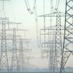 black electric tower under white sky during daytime