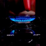 blue and red lighted gas stove