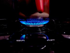blue and red lighted gas stove