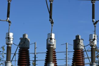 a group of towers with wires