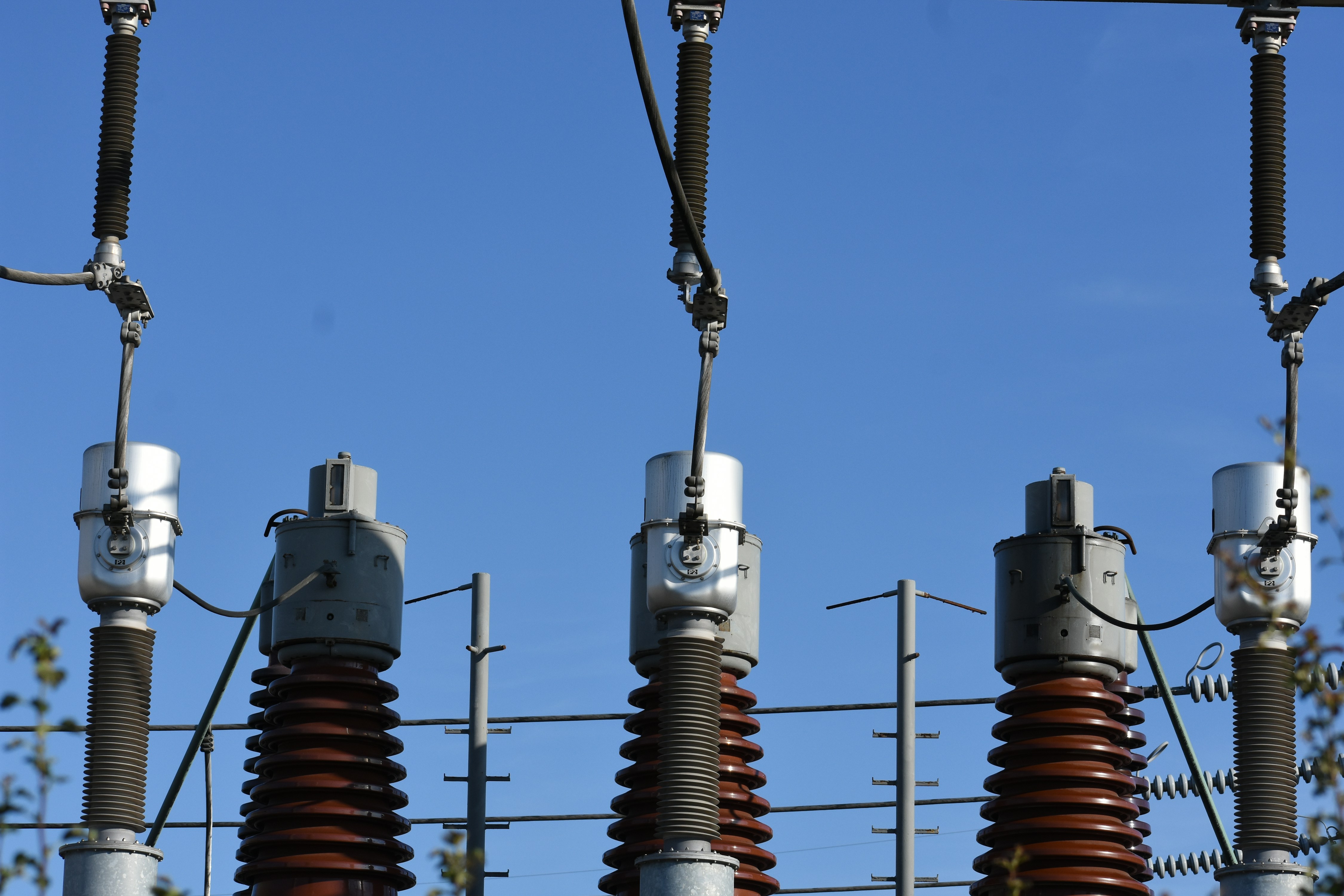 a group of towers with wires